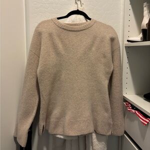 Reformation sweater.